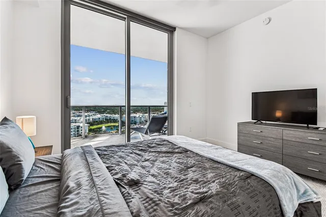 a view of balcony with wooden floor