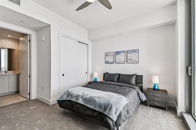 a living room with fireplace furniture and a flat screen tv