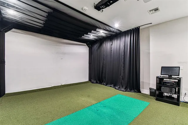 a room with lots of white furniture and window