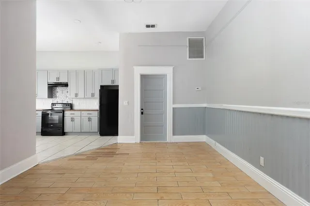 a view of a kitchen with a sink