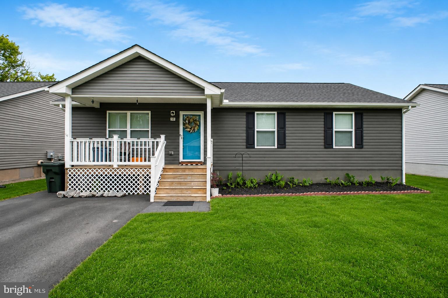 59 Rustic Lane Colonial Beach, VA 22443 - Photo 1 of 52 color correction and seasonal lawn enhancement