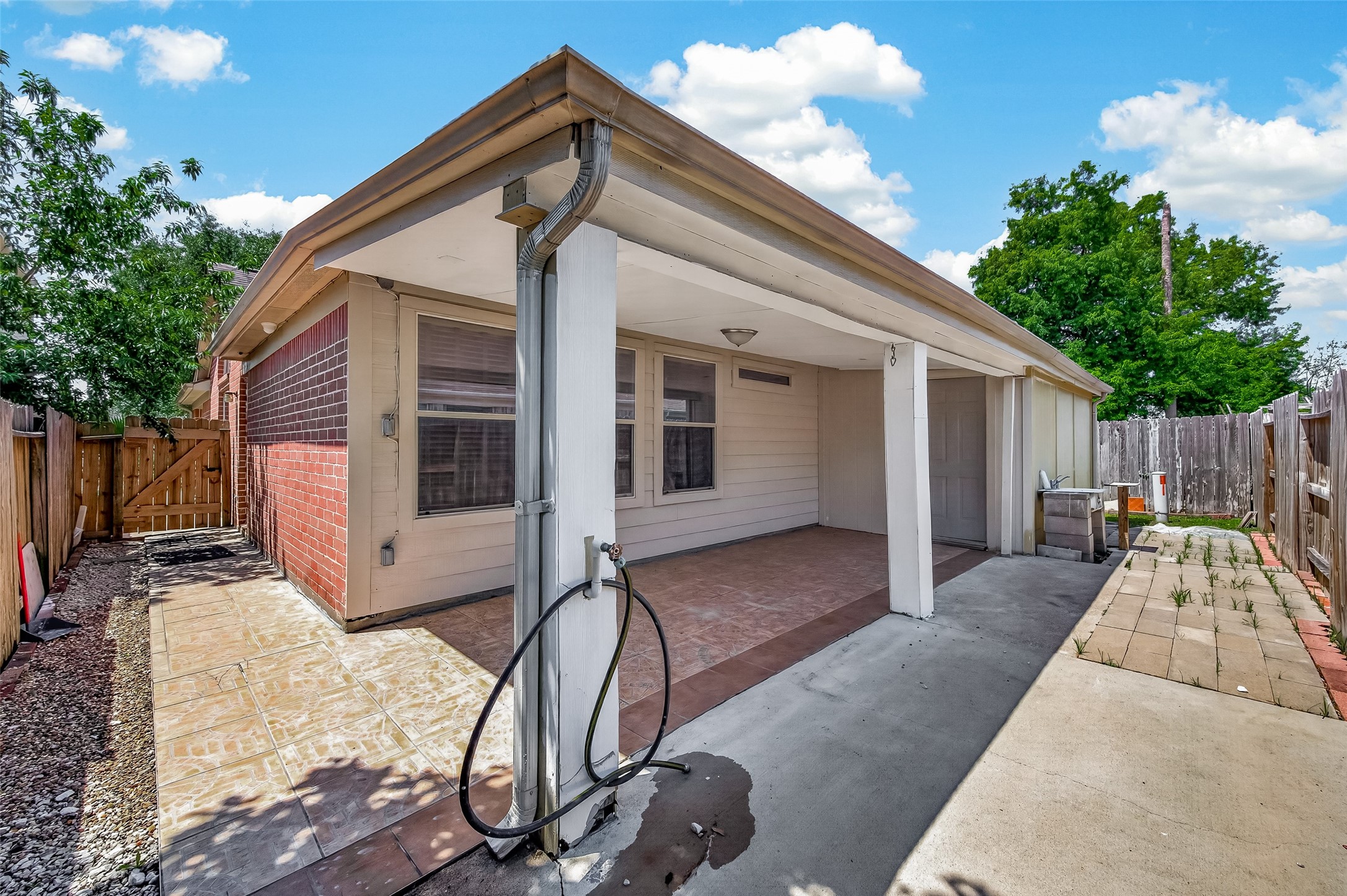 19322 Dawn Canyon Road Houston, TX 77084 - Photo 34 of 37 Covered patio area with tiled flooring,