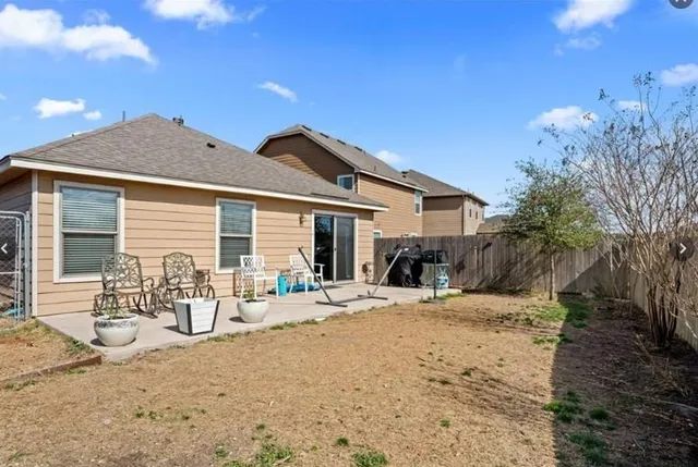 a view of a house with a patio
