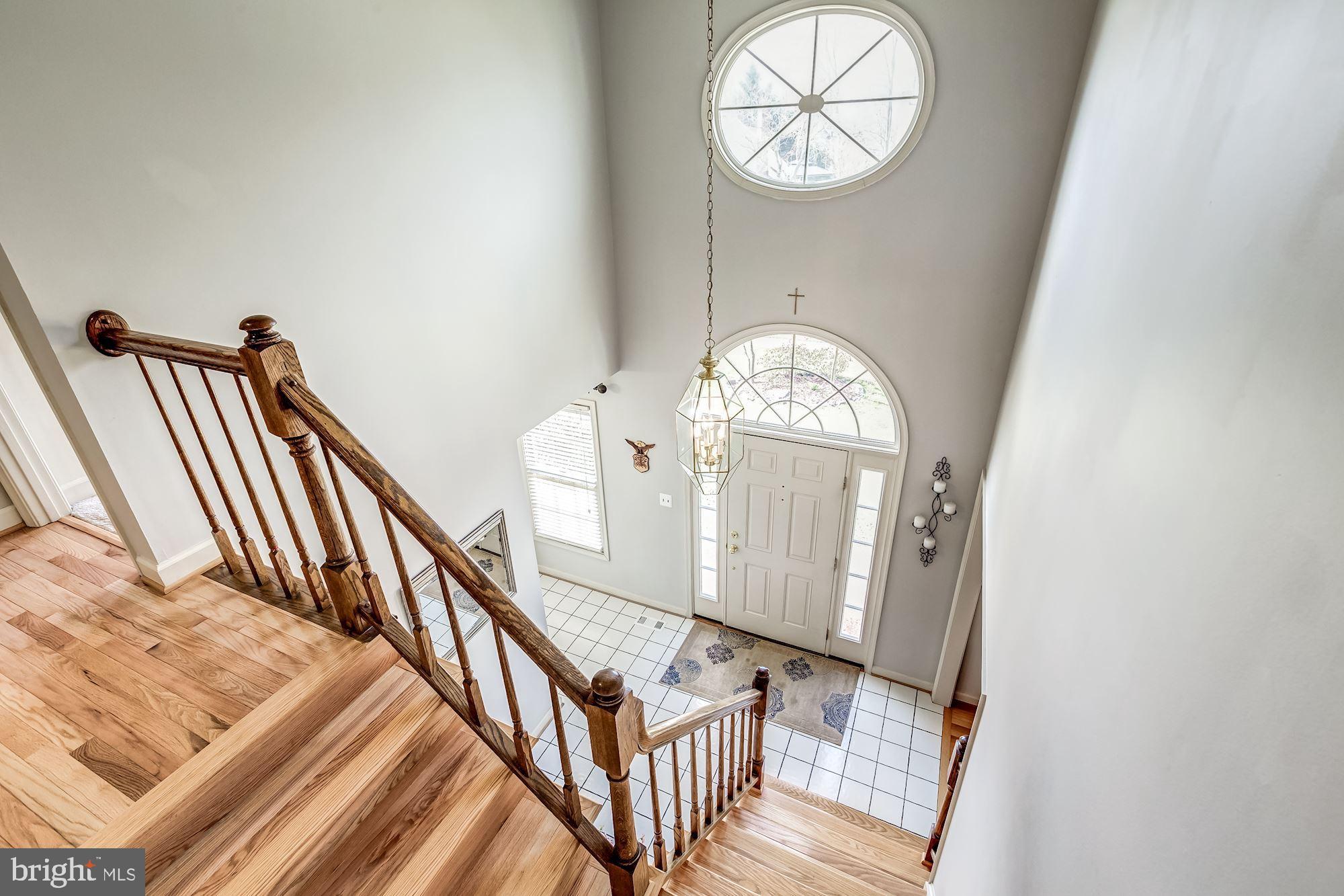 6402 Springhouse Circle Clifton, VA 20124 - Photo 25 of 43 a view of an entryway with wooden floor