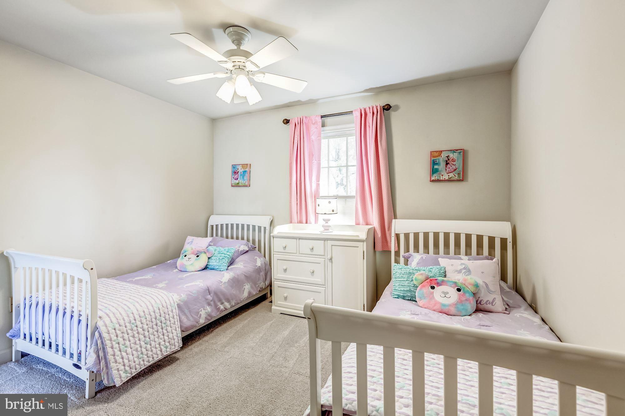 6402 Springhouse Circle Clifton, VA 20124 - Photo 35 of 43 a bedroom with a bed and a window