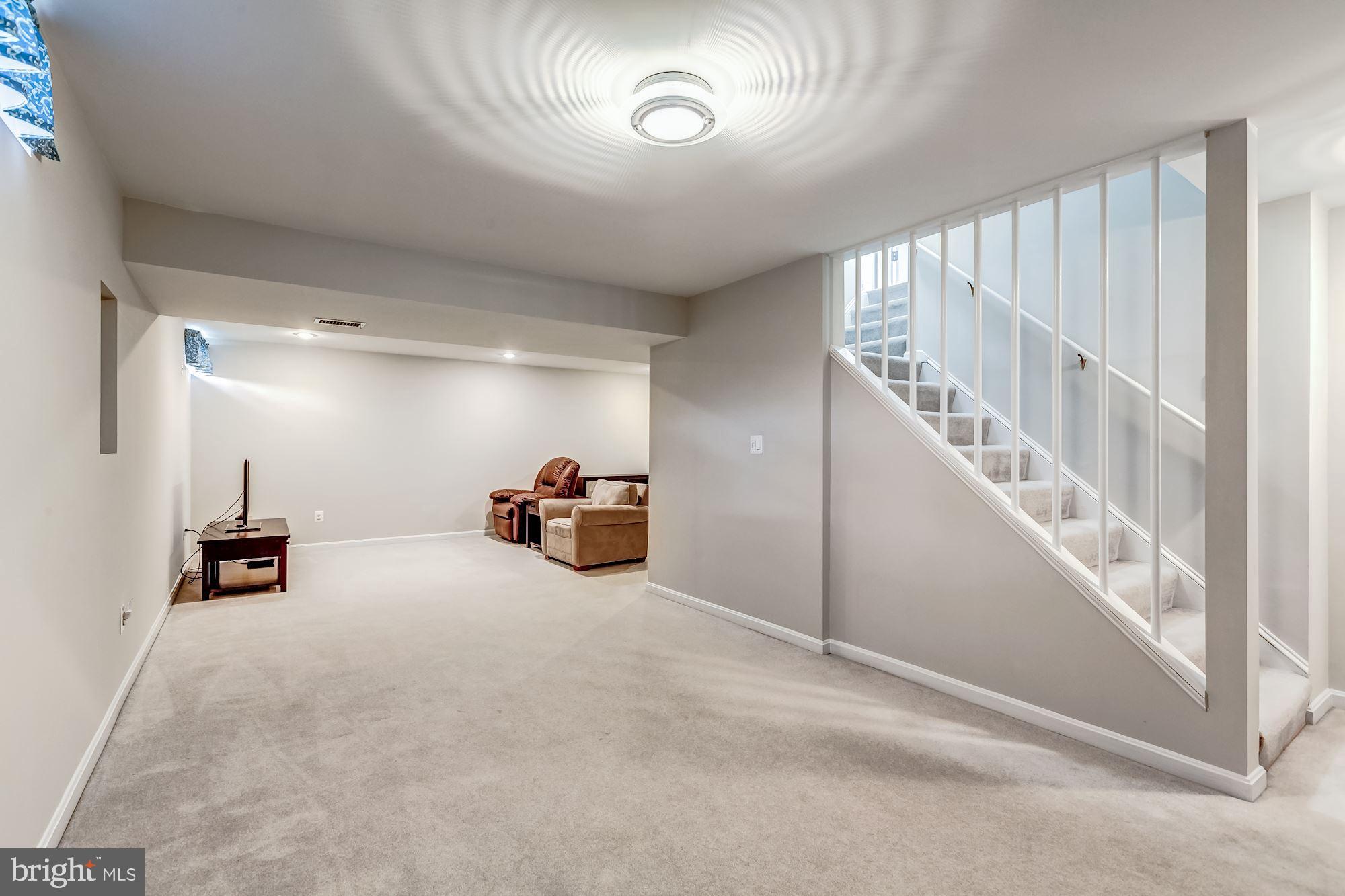 6402 Springhouse Circle Clifton, VA 20124 - Photo 36 of 43 a view of hallway with livingroom and furniture