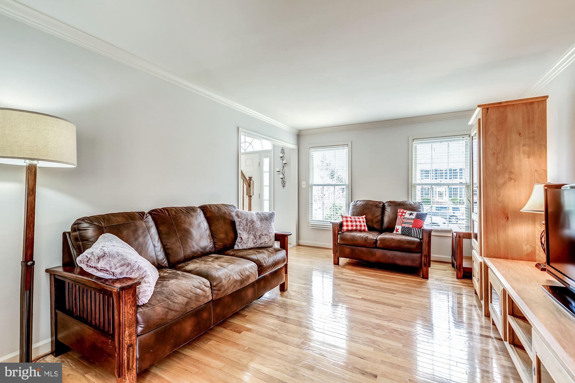 6402 Springhouse Circle Clifton, VA 20124 - Photo 8 of 43 a living room with furniture or couch and a flat screen tv