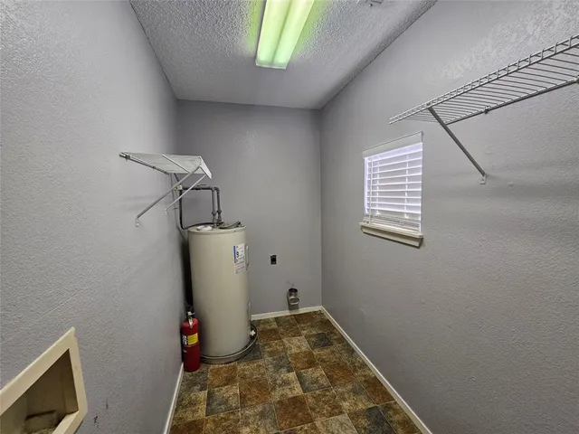 a room with storage and utility