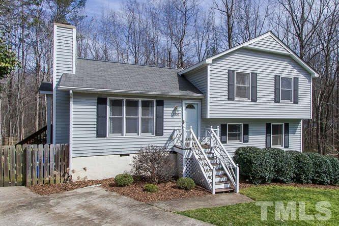 1100 Toppe Ridge Court Raleigh, NC 27615 - Photo 22 of 22 a front view of a house with a yard