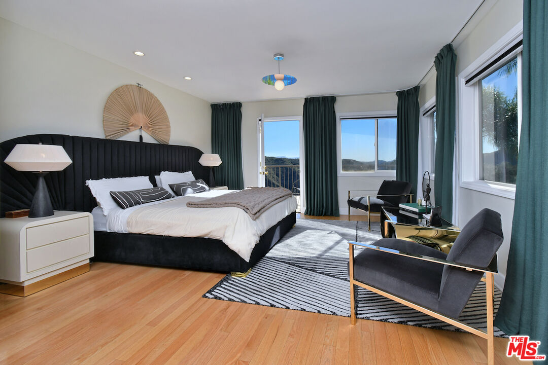 130 Dapplegray Road Bell Canyon, CA 91307 - Photo 17 of 48 a bedroom with bed and a couch