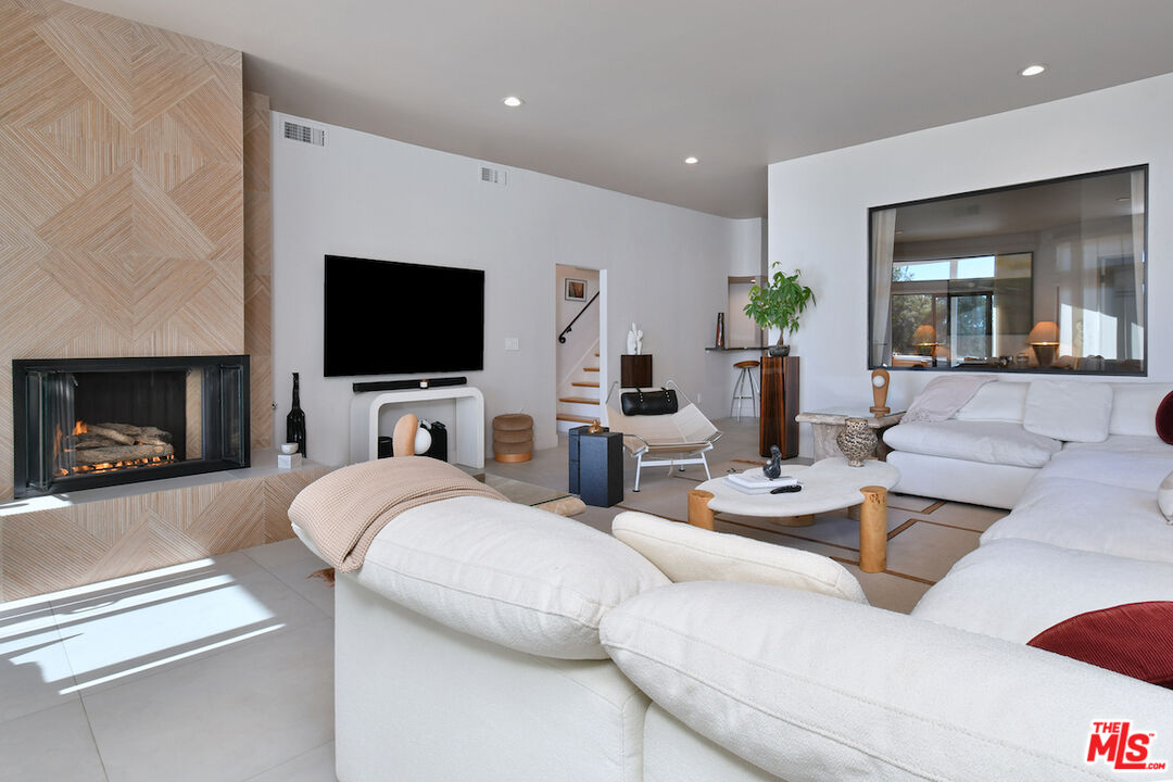 130 Dapplegray Road Bell Canyon, CA 91307 - Photo 29 of 48 a living room with furniture and a flat screen tv