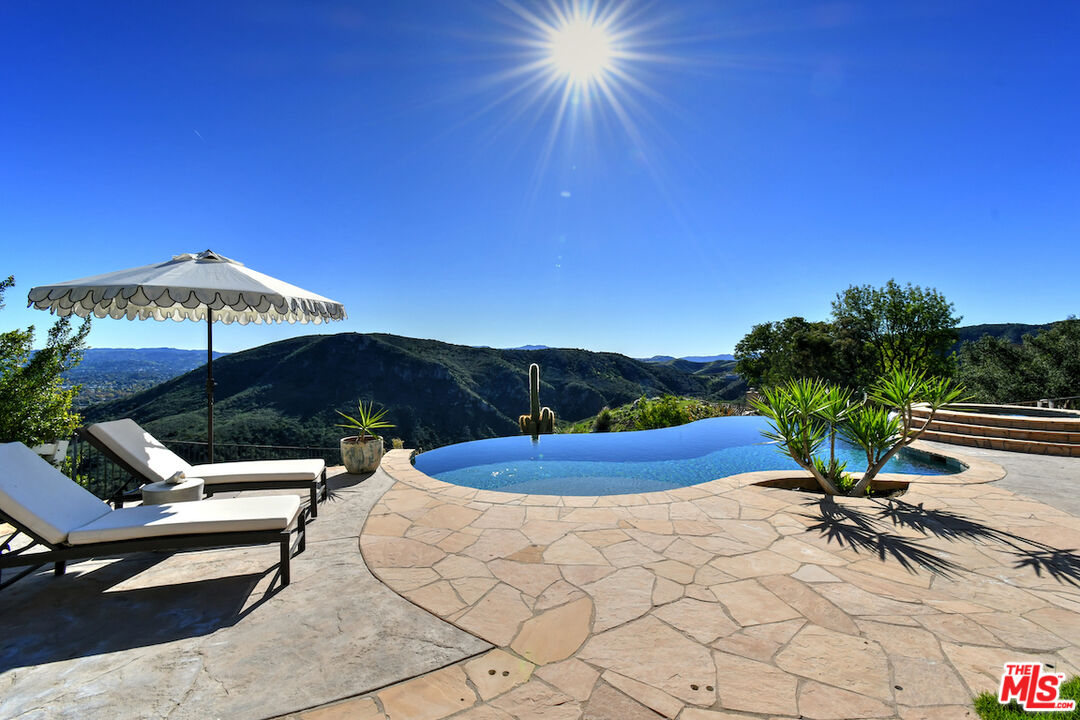130 Dapplegray Road Bell Canyon, CA 91307 - Photo 35 of 48 a view of a backyard and chairs