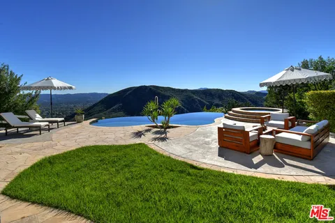 a view of a road with a building in the background