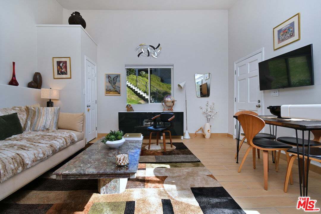 130 Dapplegray Road Bell Canyon, CA 91307 - Photo 40 of 48 a living room with furniture and a flat screen tv
