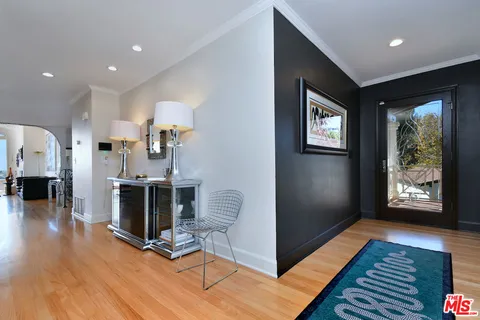 a kitchen with stainless steel appliances granite countertop a stove and a sink