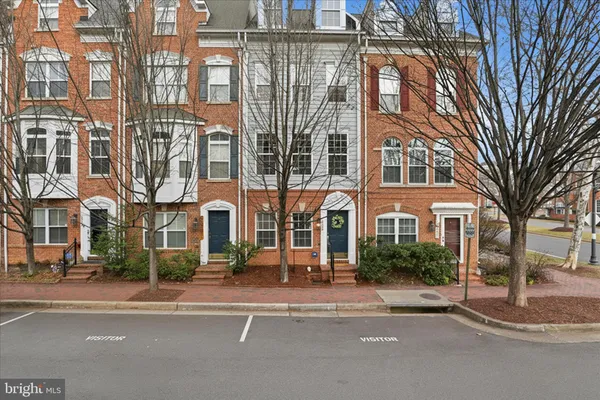 a flower garden is sitting in front of a building