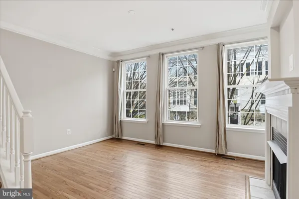 a view of entryway with wooden floor