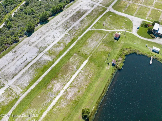a aerial view of a house with garden