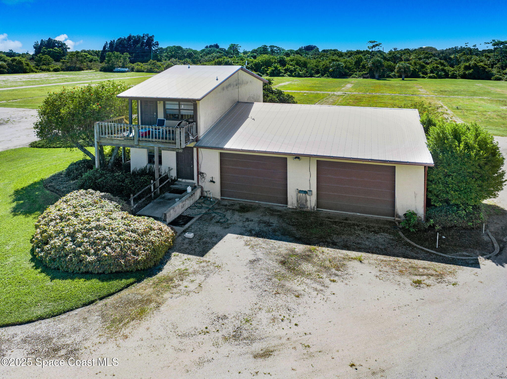 C Berry Road Grant Valkaria, FL 32949 - Photo 42 of 46 front view of a house with a yard