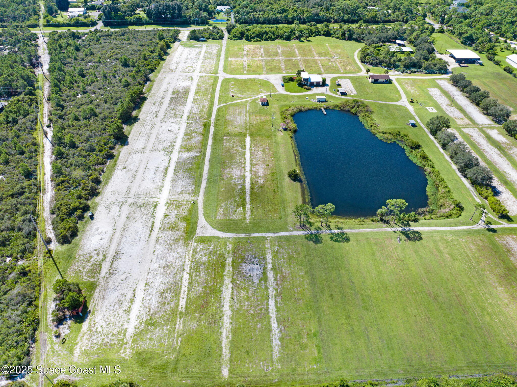 C Berry Road Grant Valkaria, FL 32949 - Photo 10 of 46 a view of a swimming pool