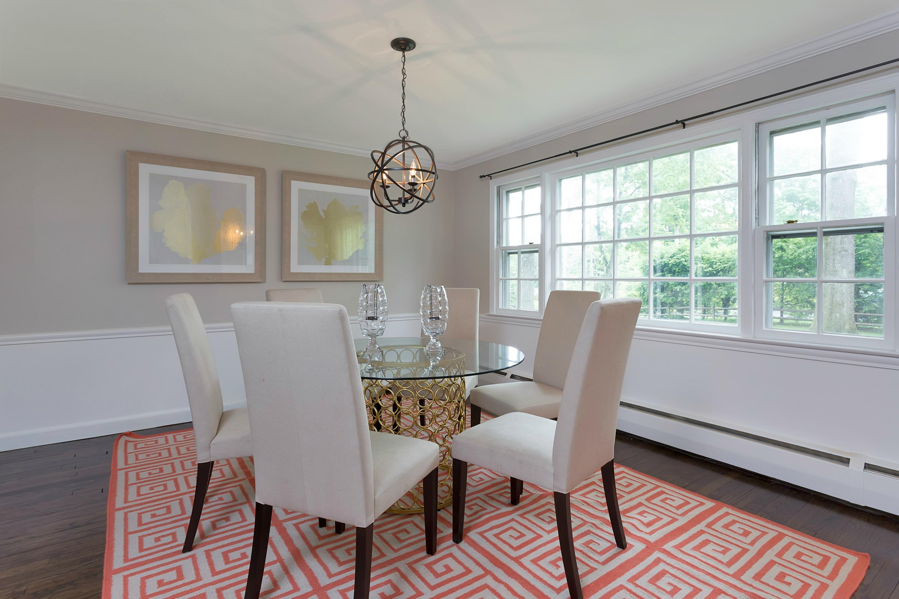 276 Smith Ridge Road New Canaan, CT 06840 - Photo 7 of 23 a view of a dining room with furniture window and wooden floor