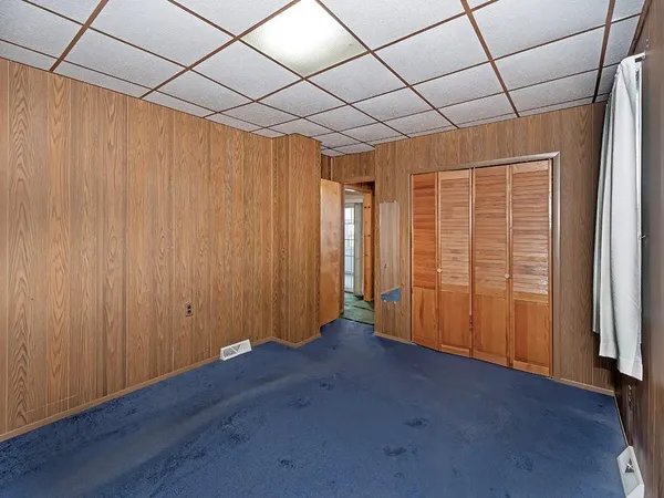 a view of a room with windows