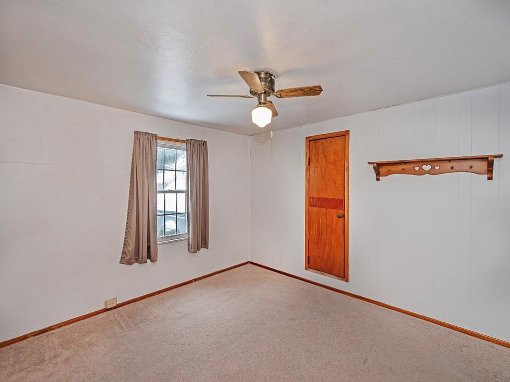 127 Lily Street Apollo, PA 15613 - Photo 17 of 27 an empty room with windows and fan