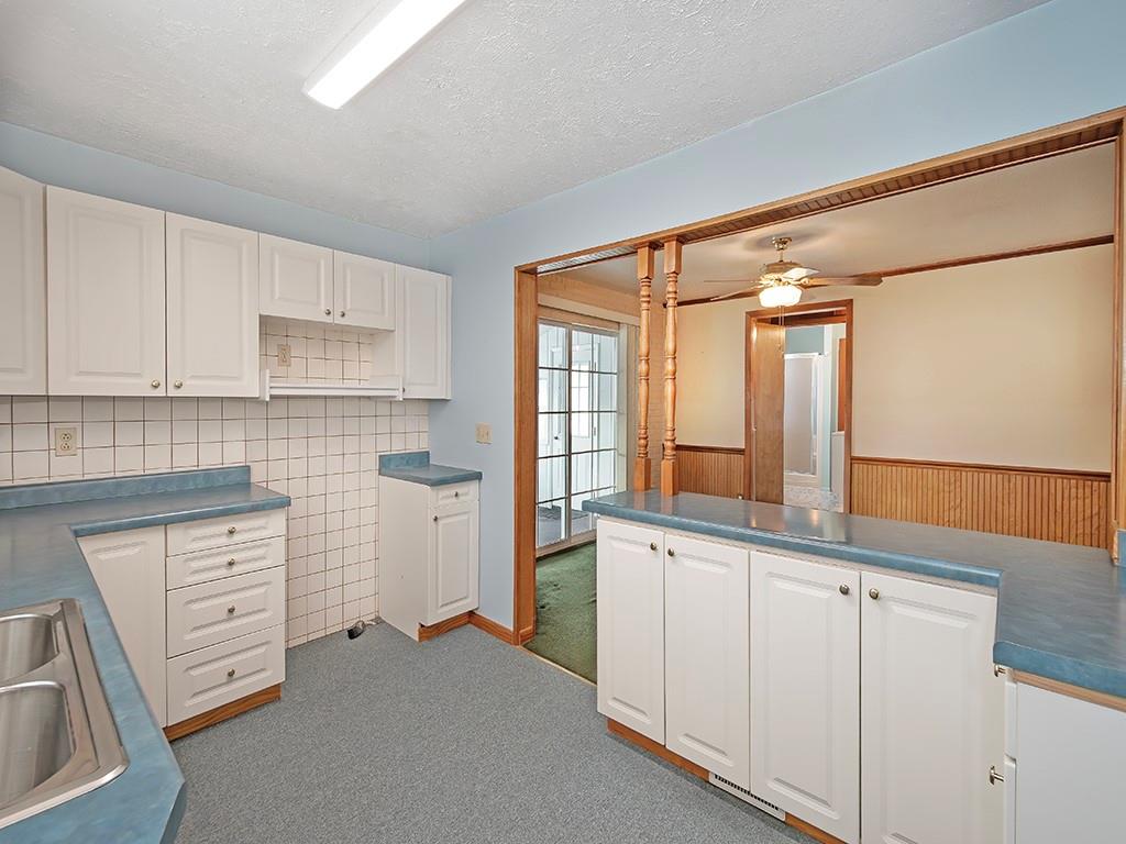 127 Lily Street Apollo, PA 15613 - Photo 10 of 27 a kitchen with white cabinets and sink