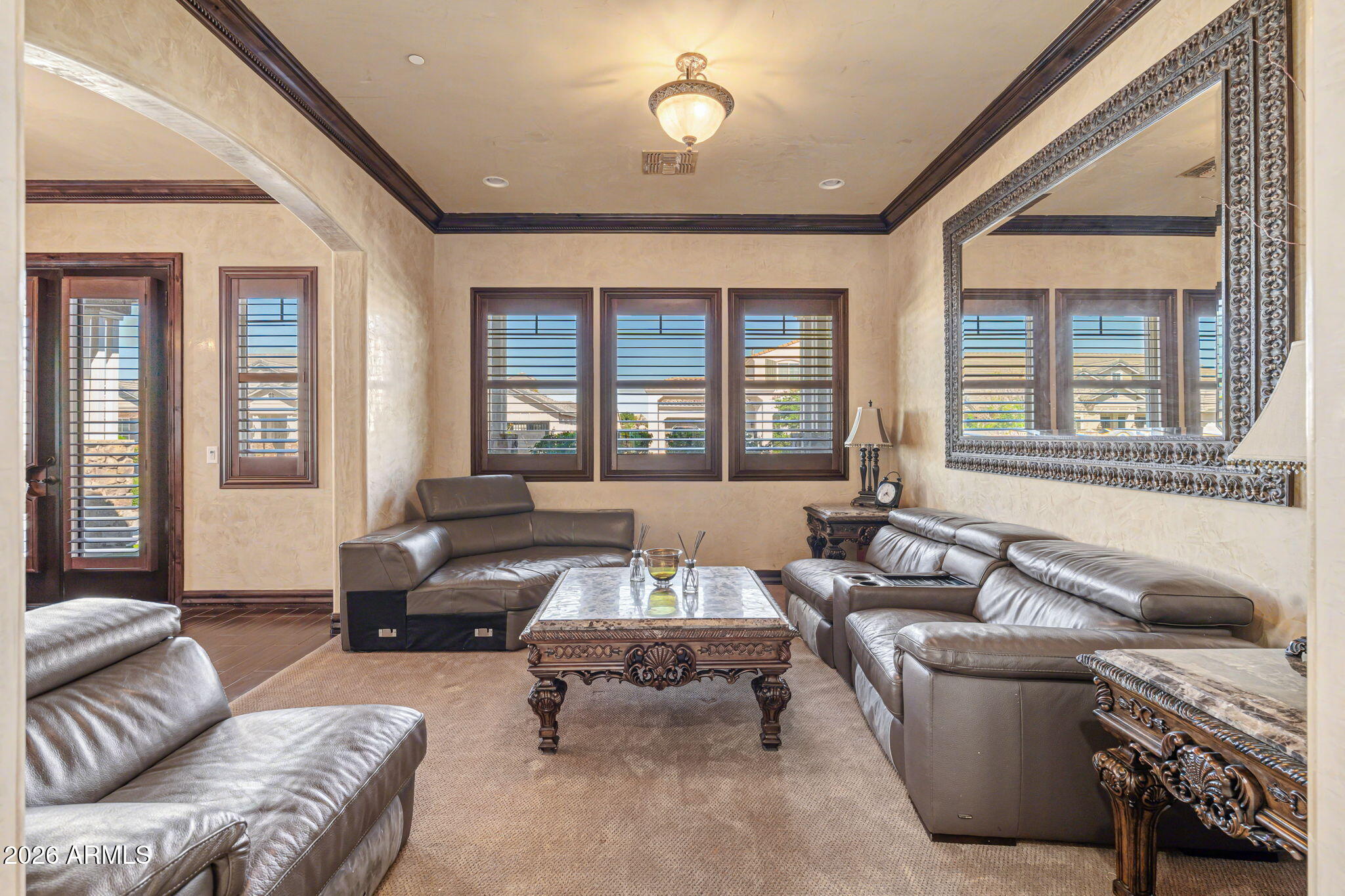 2822 East Constance Way Phoenix, AZ 85042 - Photo 11 of 64 a living room with furniture and a large window