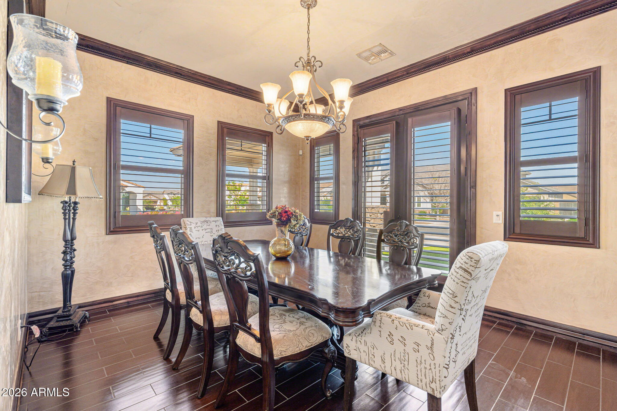 2822 East Constance Way Phoenix, AZ 85042 - Photo 13 of 64 a view of a dining room with furniture window and outside view