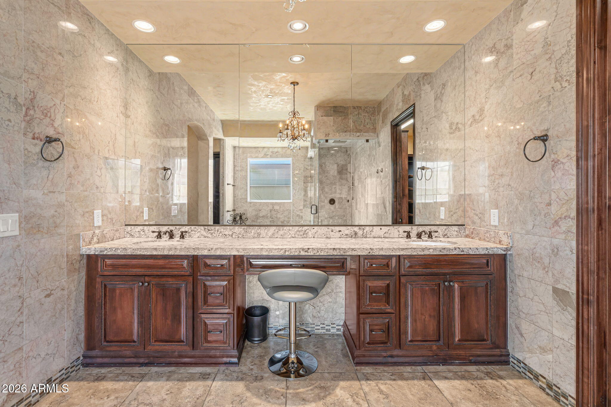 2822 East Constance Way Phoenix, AZ 85042 - Photo 35 of 64 a bathroom with a sink and a mirror