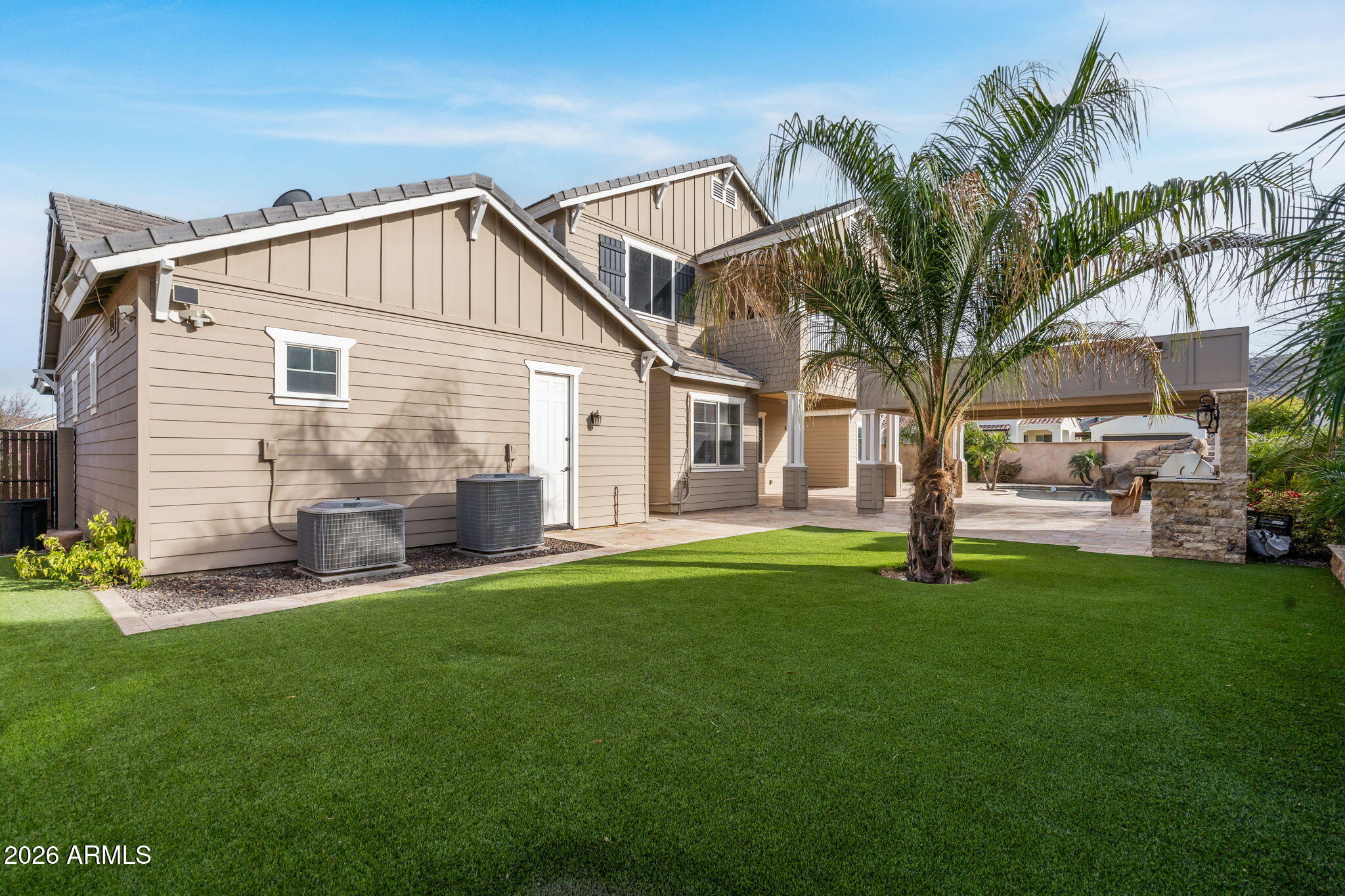 2822 East Constance Way Phoenix, AZ 85042 - Photo 49 of 64 a view of a house with a yard