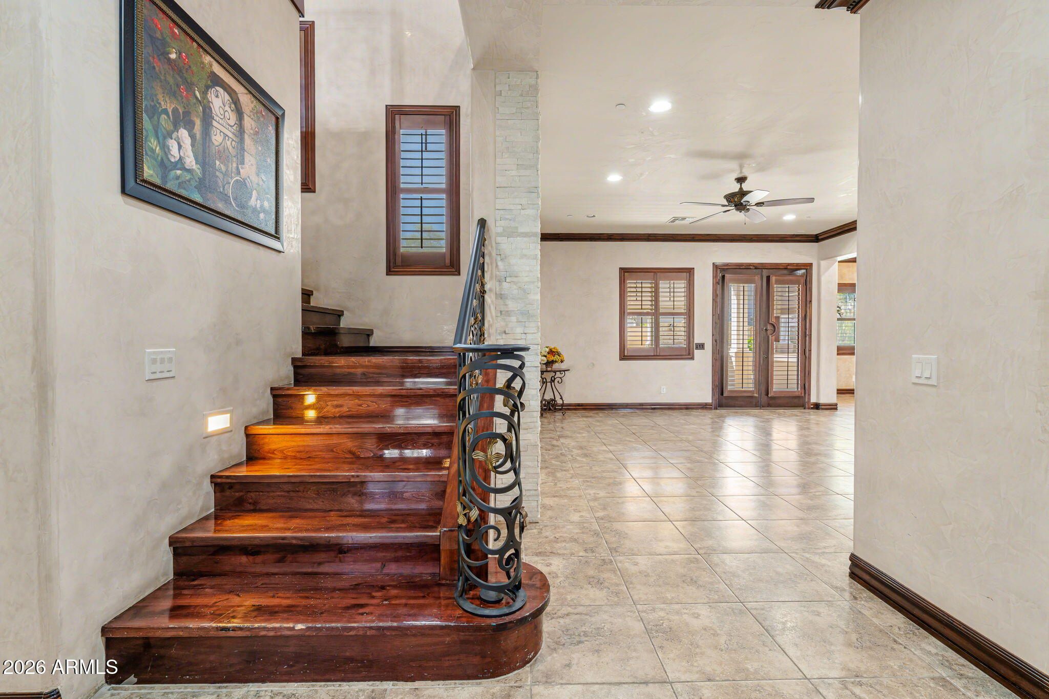 2822 East Constance Way Phoenix, AZ 85042 - Photo 7 of 64 a view of an entryway with wooden floor