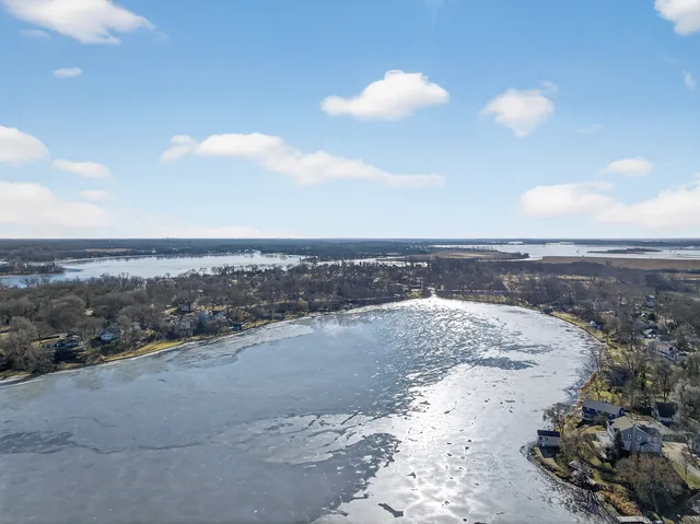 a view of a lake with a beach