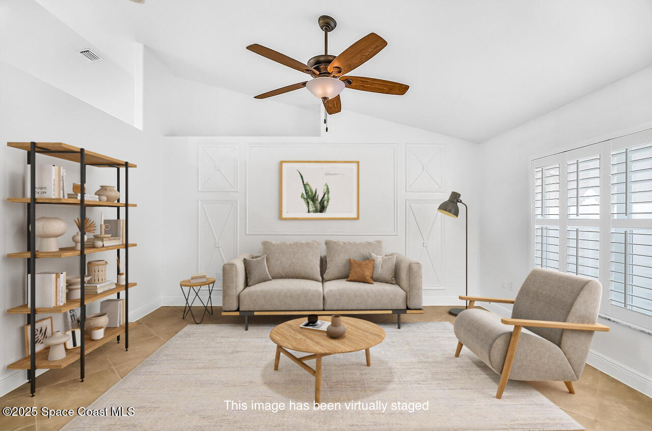 3024 Constellation Drive Melbourne, FL 32940 - Photo 2 of 31 Living Room Staged
