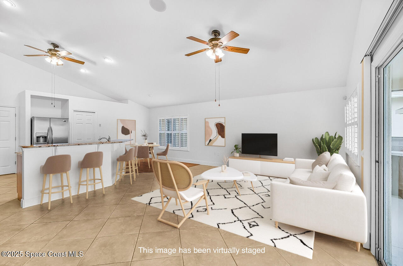 3024 Constellation Drive Melbourne, FL 32940 - Photo 10 of 31 Family Room Staged