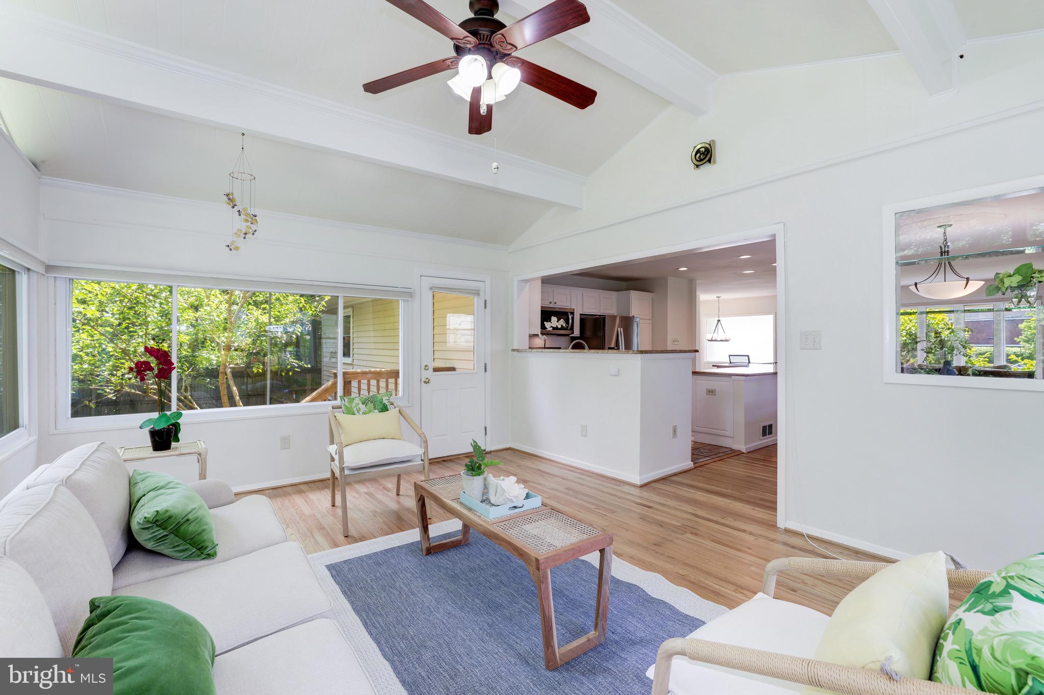 8305 Fort Hunt Road Alexandria, VA 22308 - Photo 11 of 74 a living room with furniture and a large window