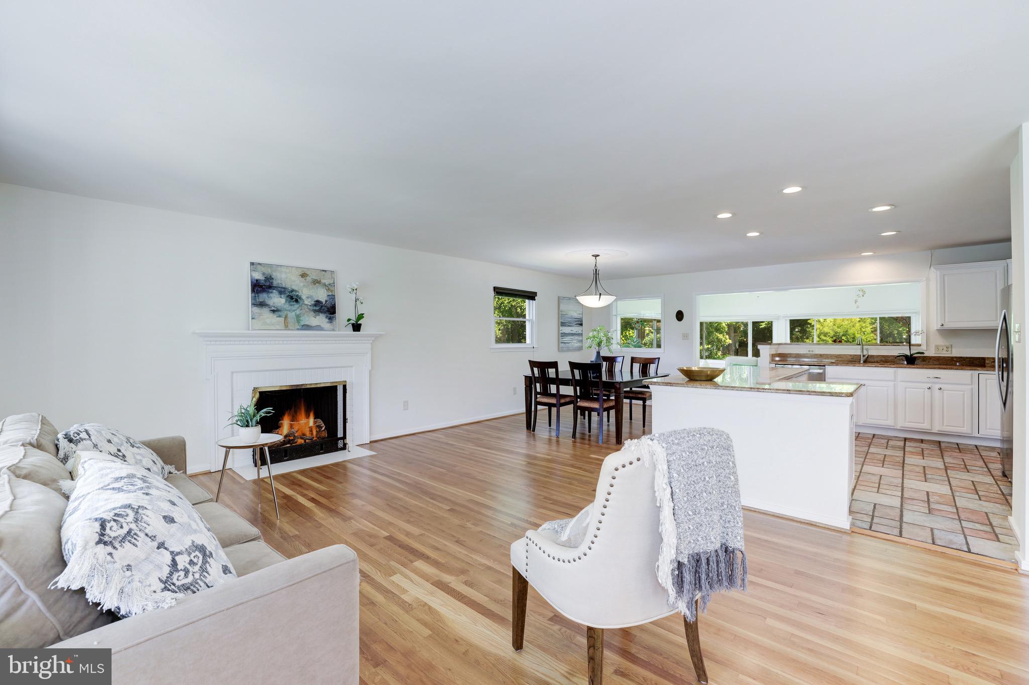 8305 Fort Hunt Road Alexandria, VA 22308 - Photo 12 of 74 a living room with furniture and fireplace