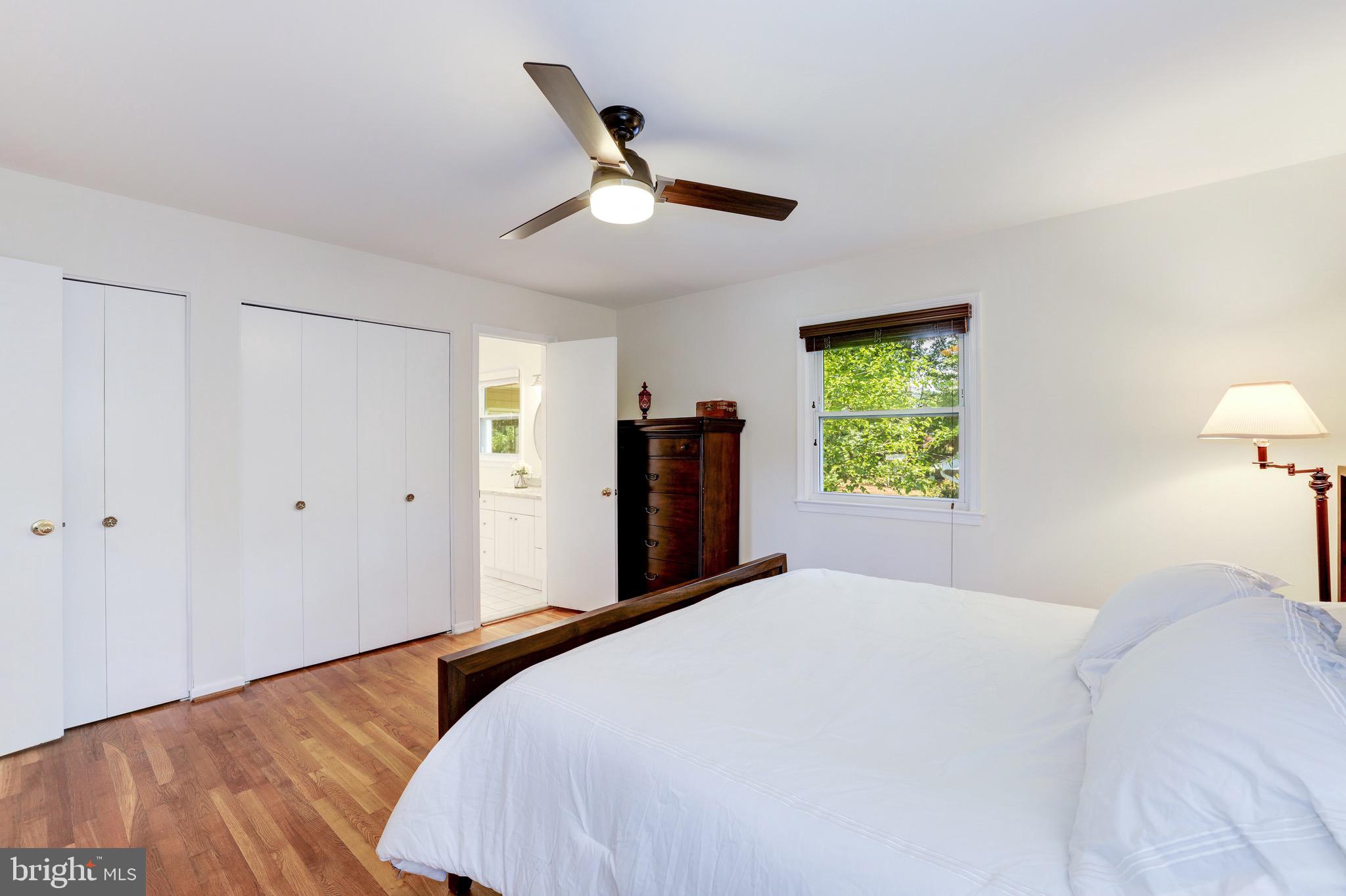 8305 Fort Hunt Road Alexandria, VA 22308 - Photo 36 of 74 a bedroom with a bed and a window