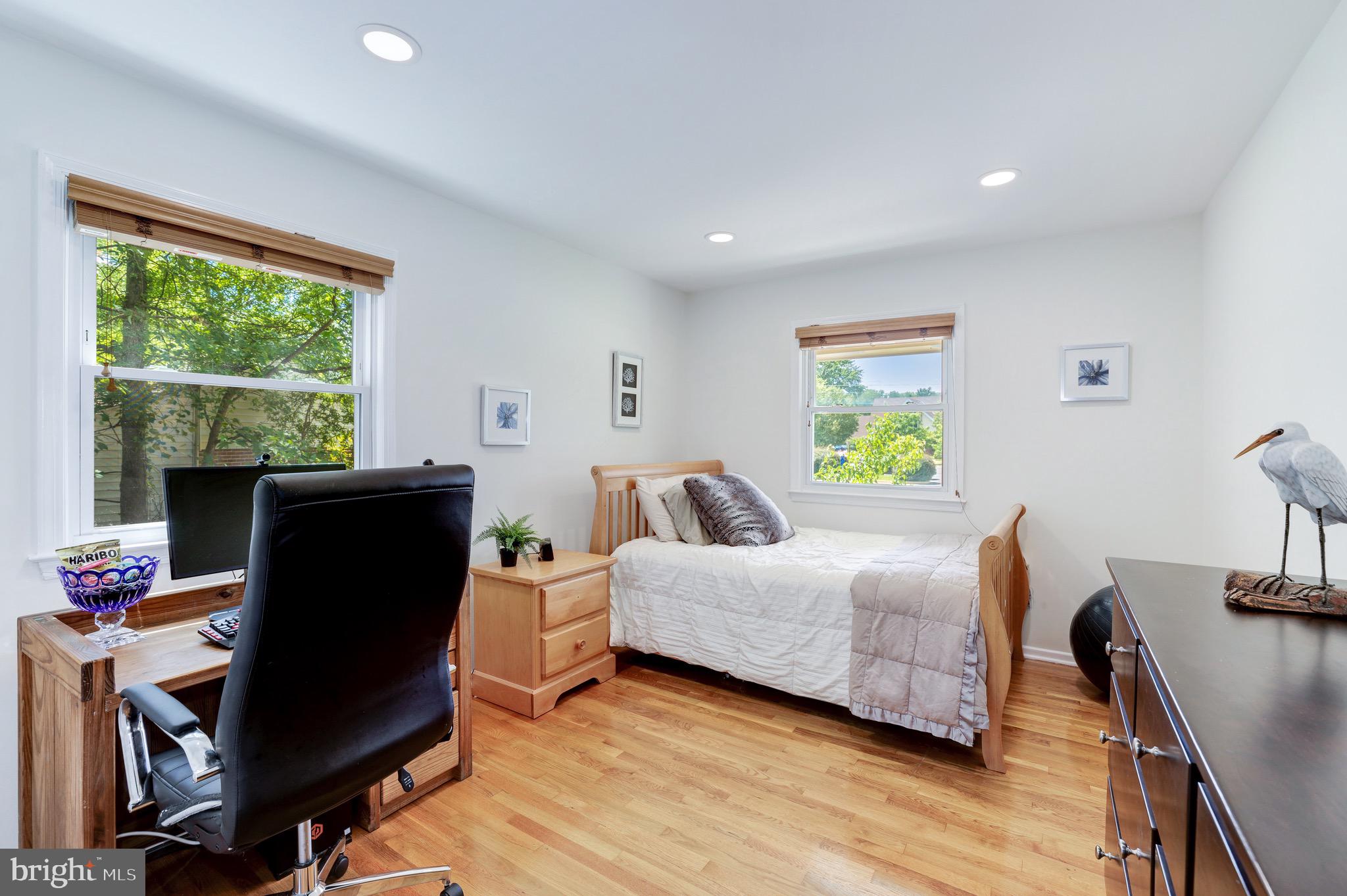 8305 Fort Hunt Road Alexandria, VA 22308 - Photo 38 of 74 a bedroom with a bed and a window