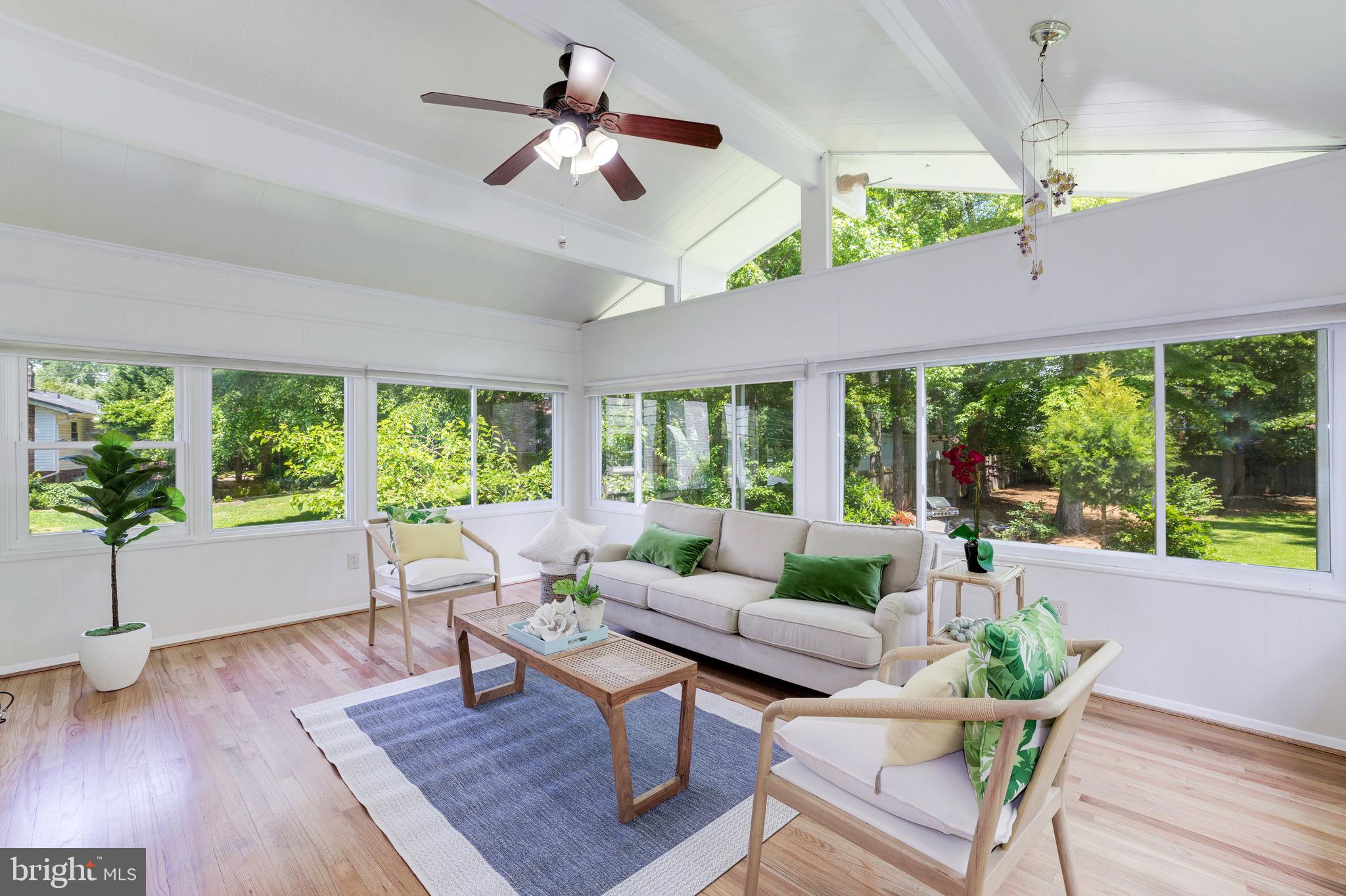8305 Fort Hunt Road Alexandria, VA 22308 - Photo 8 of 74 a living room with furniture and a large window