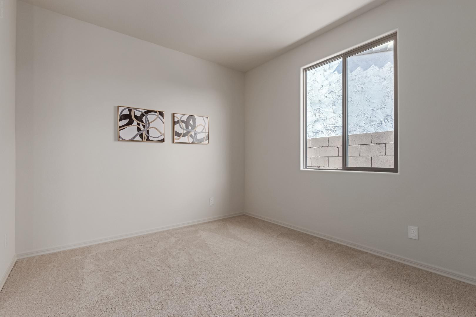 7143 West Coles Road Laveen, AZ 85339 - Photo 12 of 15 an empty room with windows