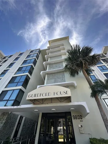 a view of building with with a space in front of it