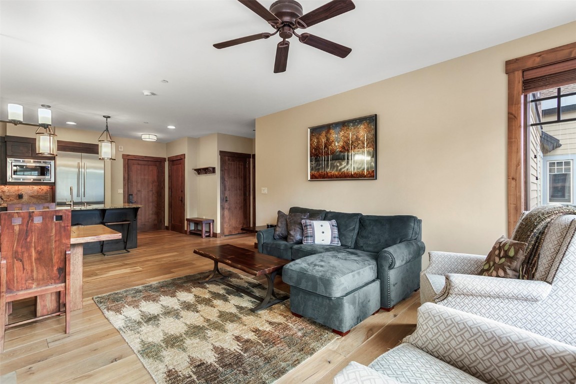 610 Columbine Road, Unit 6306 Breckenridge, CO 80424 - Photo 11 of 38 a living room with furniture and a rug