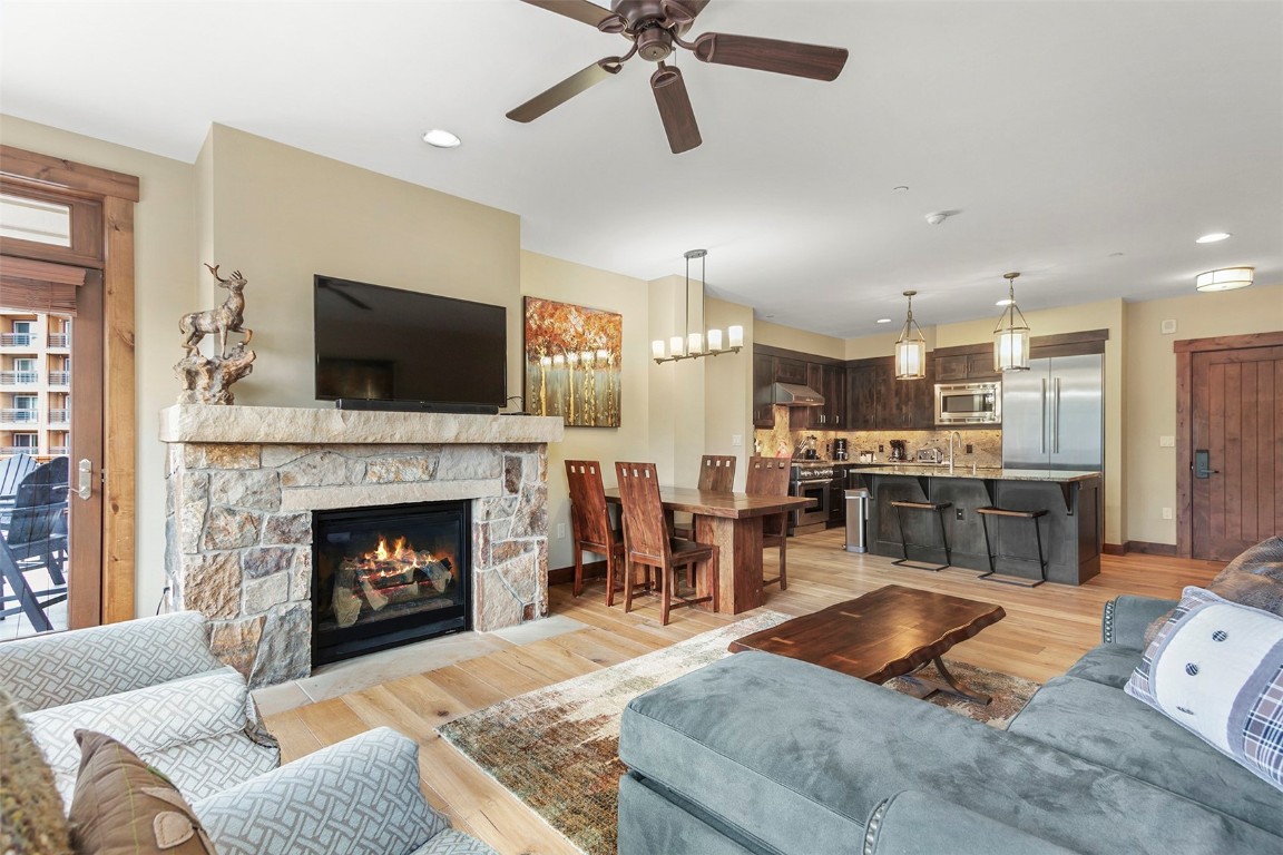 610 Columbine Road, Unit 6306 Breckenridge, CO 80424 - Photo 12 of 38 a living room with furniture fireplace and flat screen tv