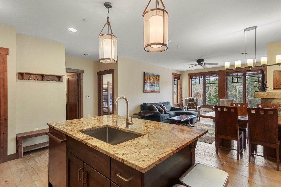 610 Columbine Road, Unit 6306 Breckenridge, CO 80424 - Photo 16 of 38 a dining table with chairs and window