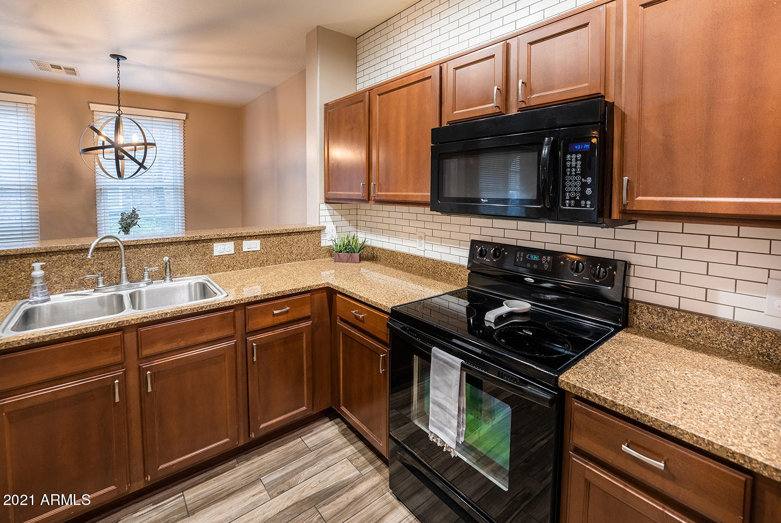 4757 East Waterman Street, Unit 103 Gilbert, AZ 85297 - Photo 8 of 31 Kitchen w/Granite,Backsplash