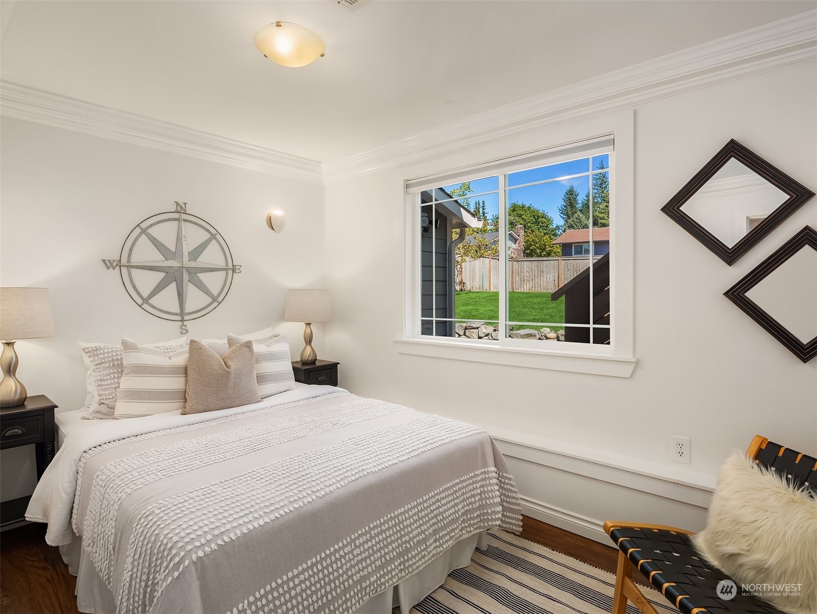 209 225th Place Southwest Bothell, WA 98021 - Photo 18 of 29 a bedroom with a bed and a window