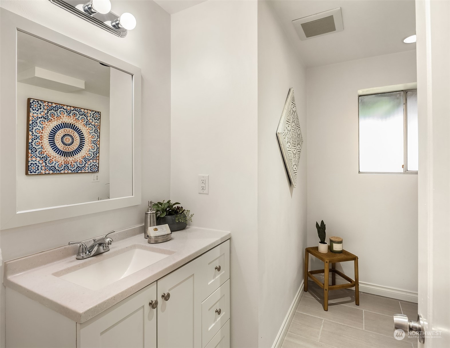 209 225th Place Southwest Bothell, WA 98021 - Photo 19 of 29 a bathroom with a sink and a mirror