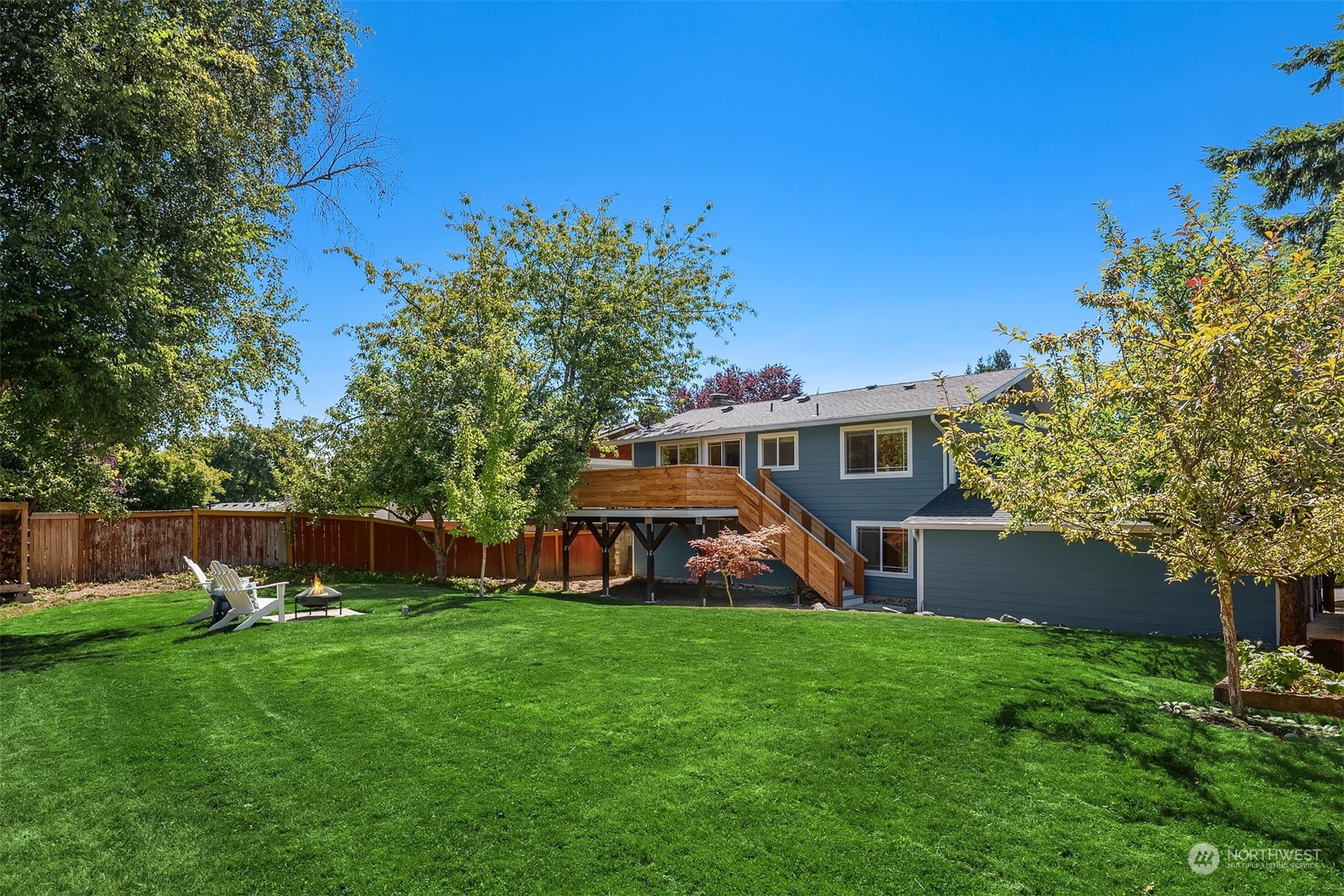 209 225th Place Southwest Bothell, WA 98021 - Photo 25 of 29 a front view of house with a garden